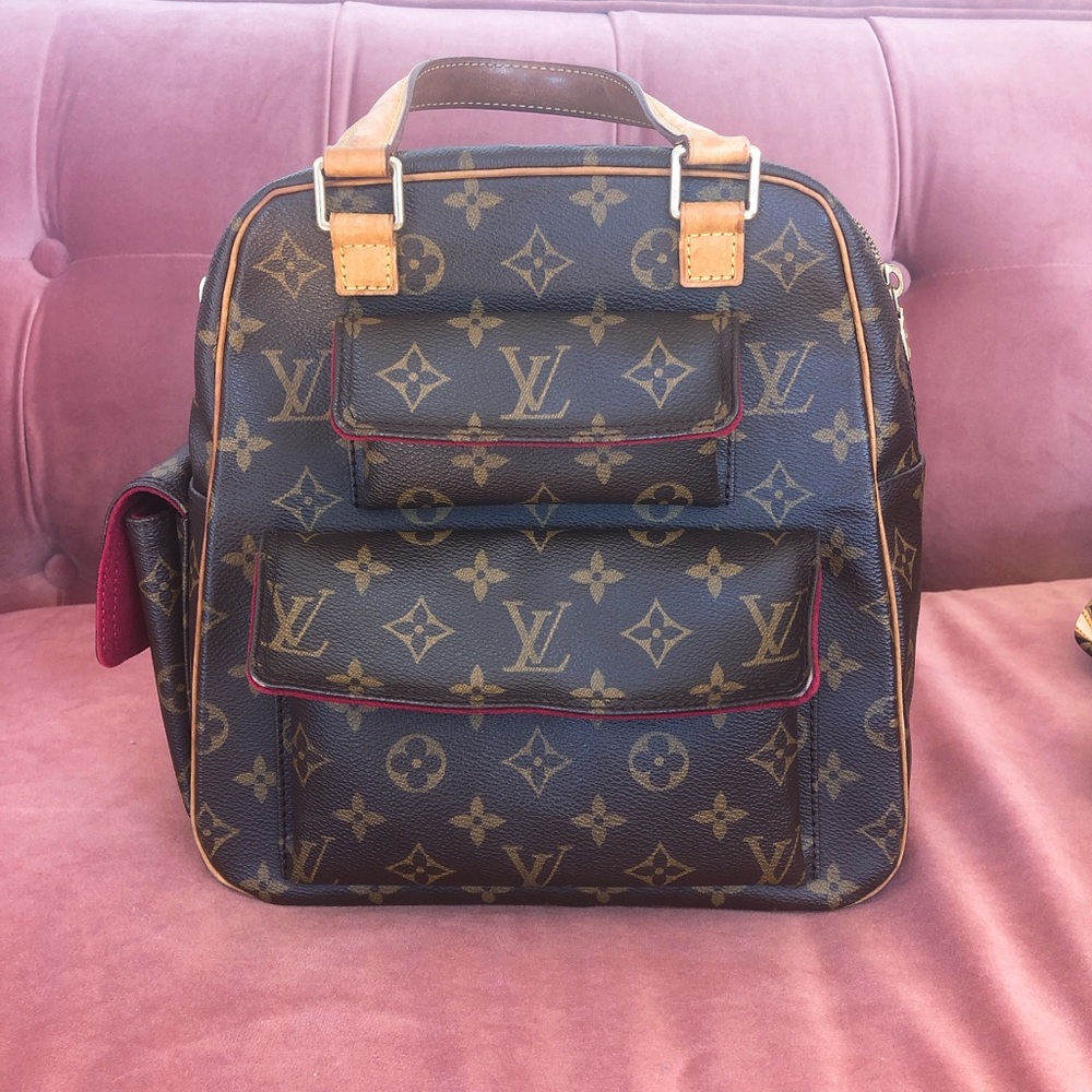 Authentic Louis Vuitton Excentric Cite Handbag